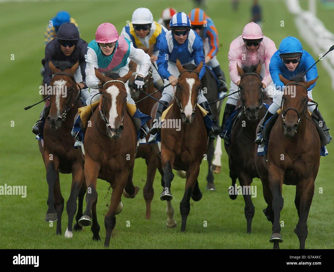 Kerrin McEvoy (right) wins the St Leger at Doncaster races, from Kieren Fallon and Quiff (Pink cap). Stock Photo