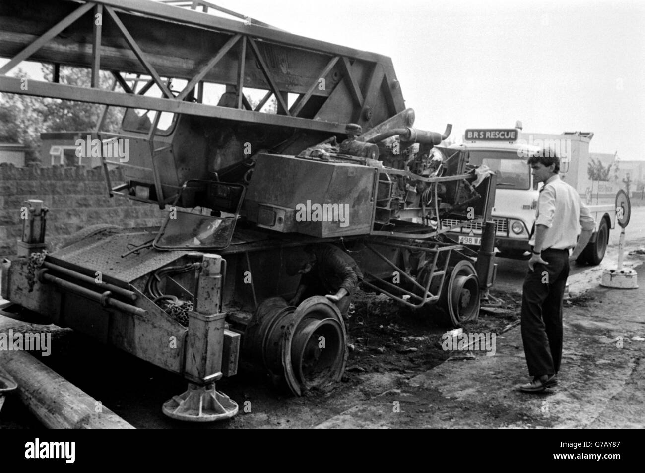 A burnt out crane at the entrance to the Markham Main NCB Colliery at Armthorpe, near Doncaster, Yorkshire, when equipment and machinery were damaged in a raid by a group dressed in para-military style. Stock Photo