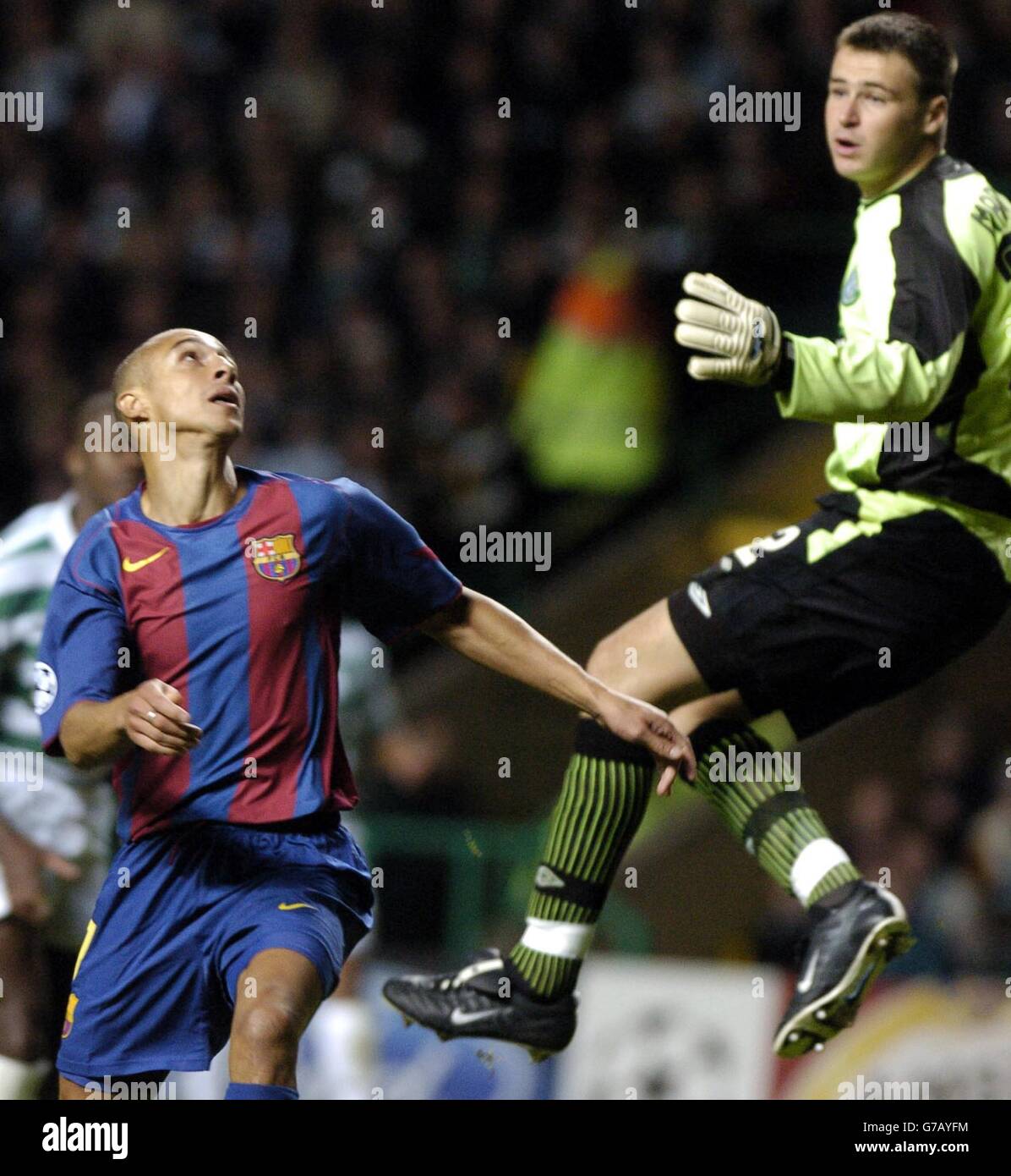 Barcelona's Henrik Larsson scores against his former club Celtic