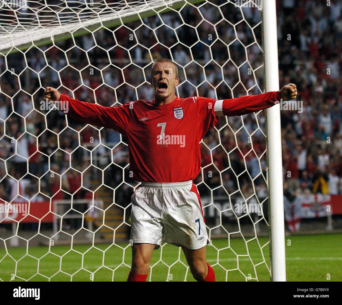 England Captain David Beckham celebrates after opening the scoring during the England and Ukraine international friendly match at St James' Park, Newcastle.. Stock Photo