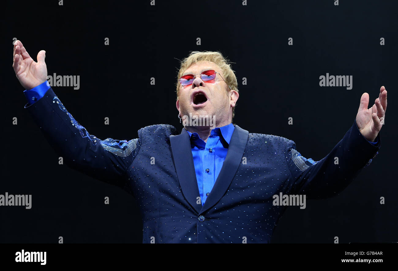 EDITORIAL USE ONLY Elton John performing on stage in a special open air