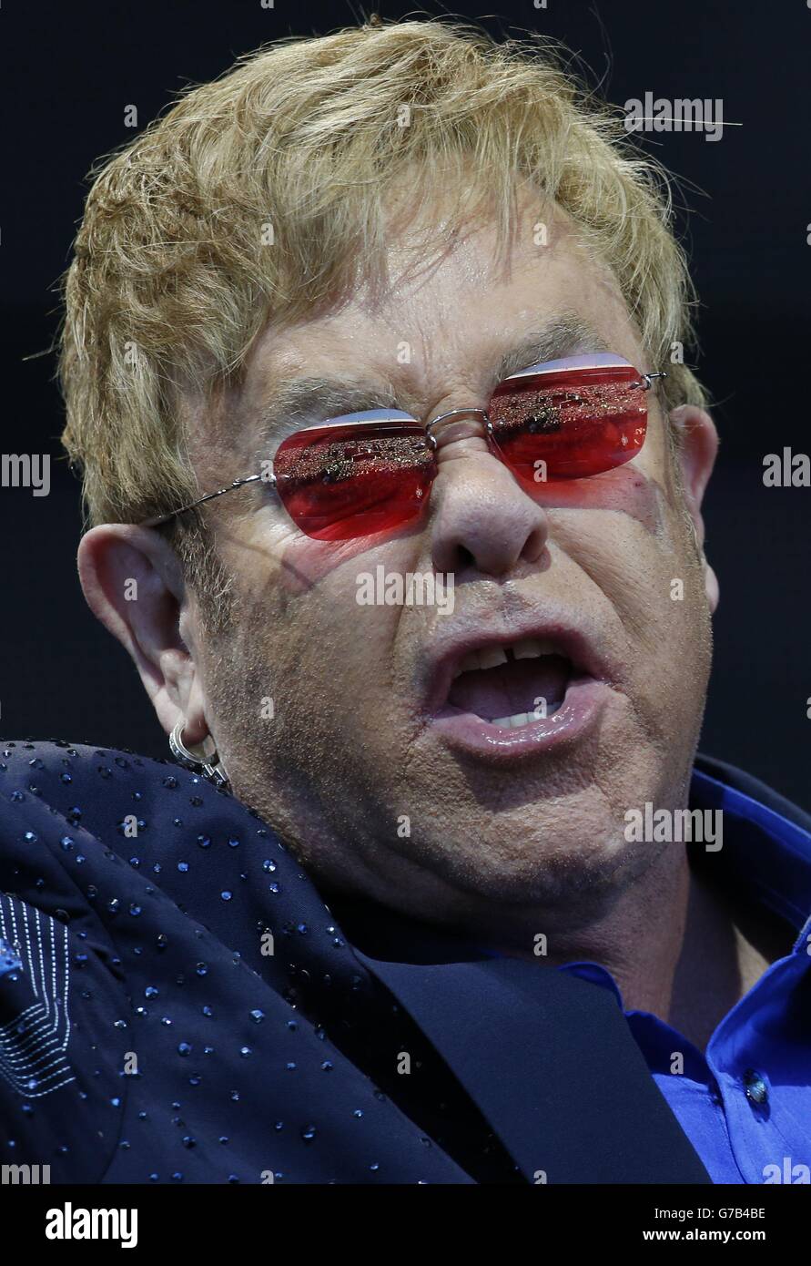 Elton John performing on stage in a special open air show at the Meadowbank Stadium in Edinburgh, during his Wonderful Crazy Night Tour. Stock Photo
