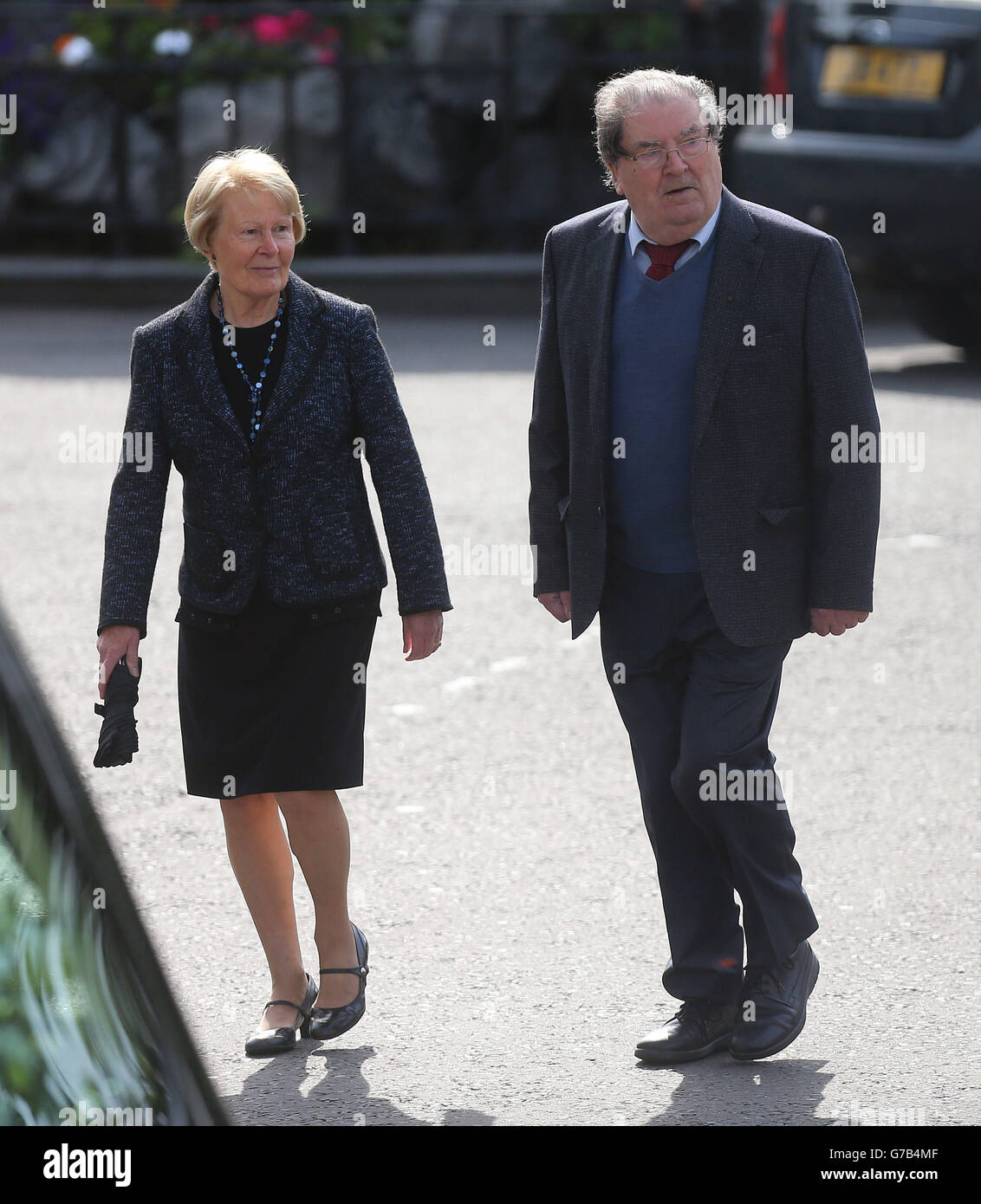 John Hume and his wife Pat arrive for the funeral of BBC broadcaster Gerry Anderson at St Eugene's Cathedral in Londonderry. Stock Photo