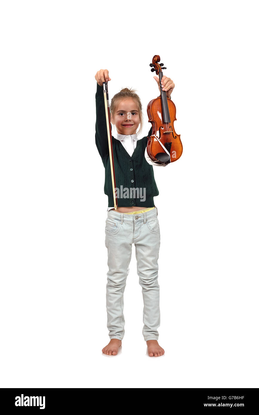 beautiful little girl holding violin and bow Stock Photo