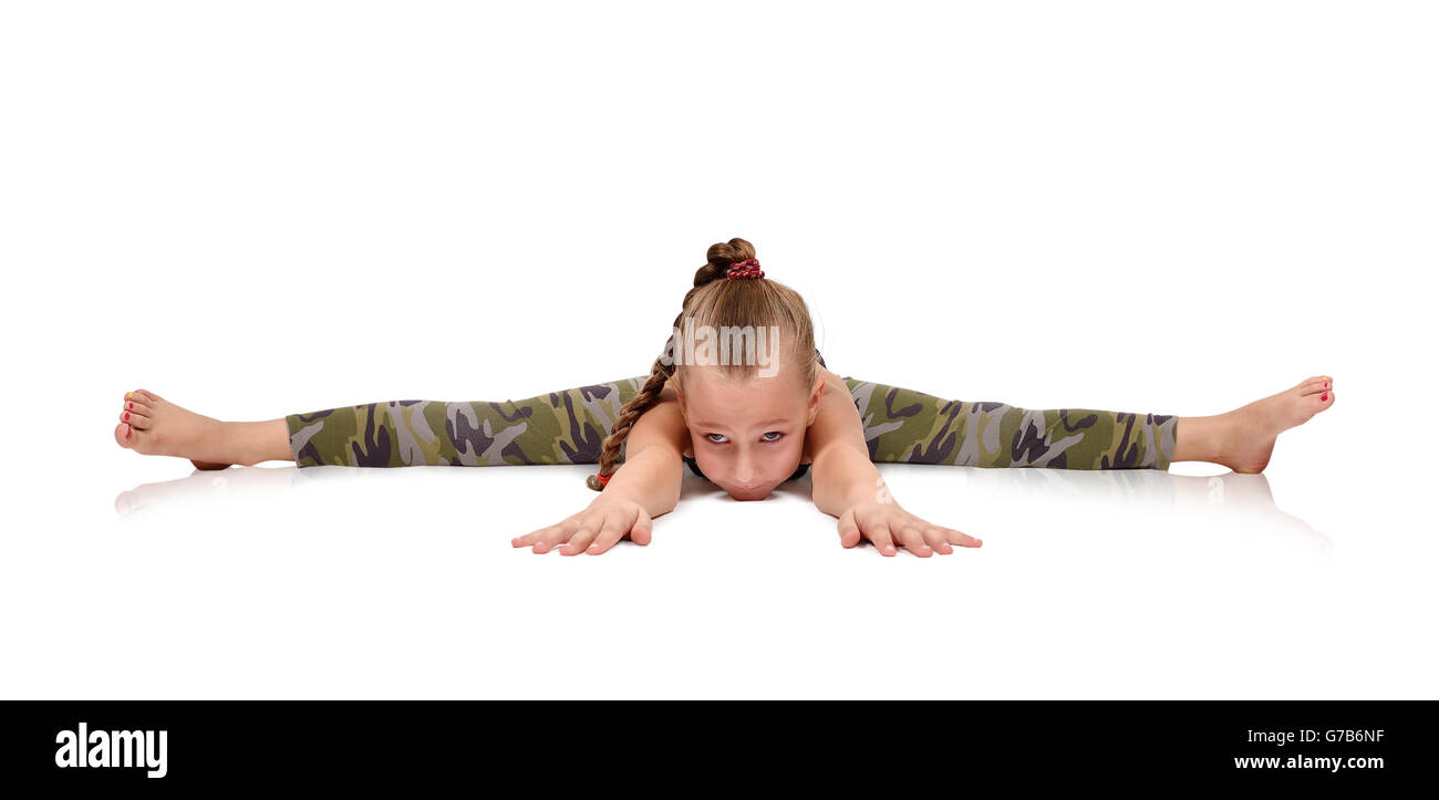 little girl does exercise, children's yoga Stock Photo