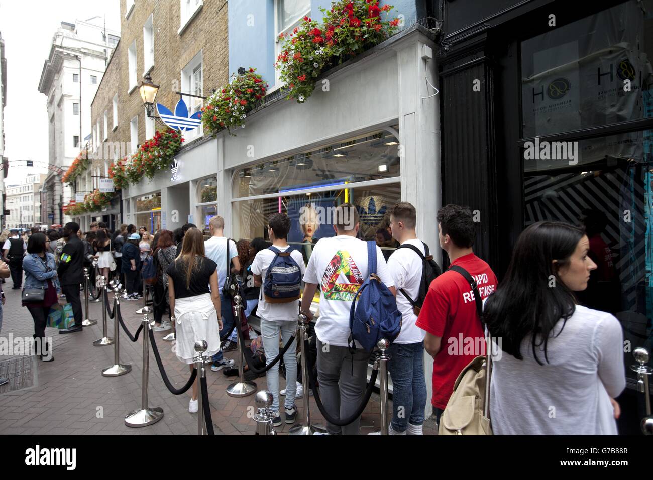 Fans queue to see Rita Ora perform at adidas Originals global launch at 15 Fouberts  Place, London Stock Photo - Alamy