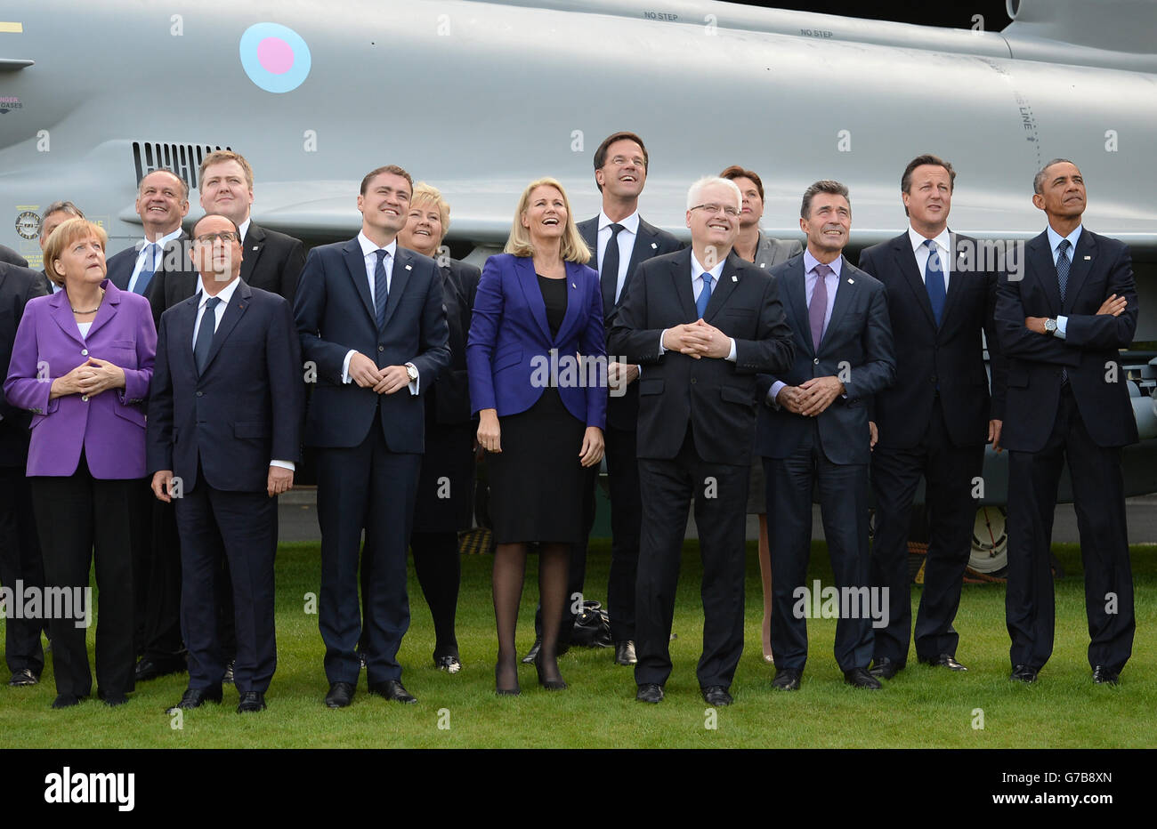 Nato leaders watch a flypast of military aircraft from Nato member countries on the final day of the summit at the Celtic Manor Resort in Newport, south Wales. Stock Photo