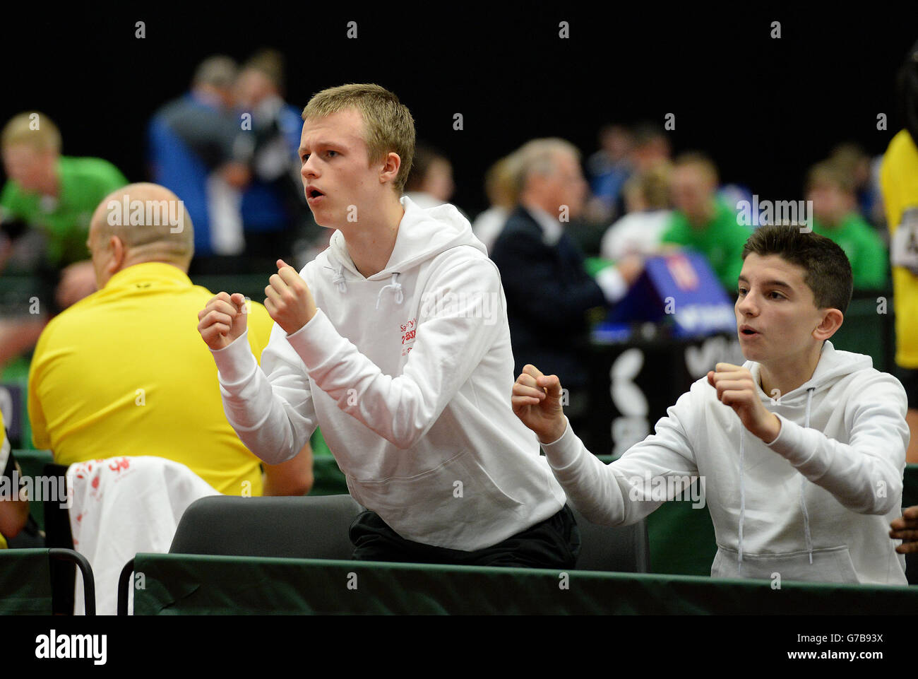Competitors cheer on their teammates in the table tennis during the Sainsbury's 2014 School