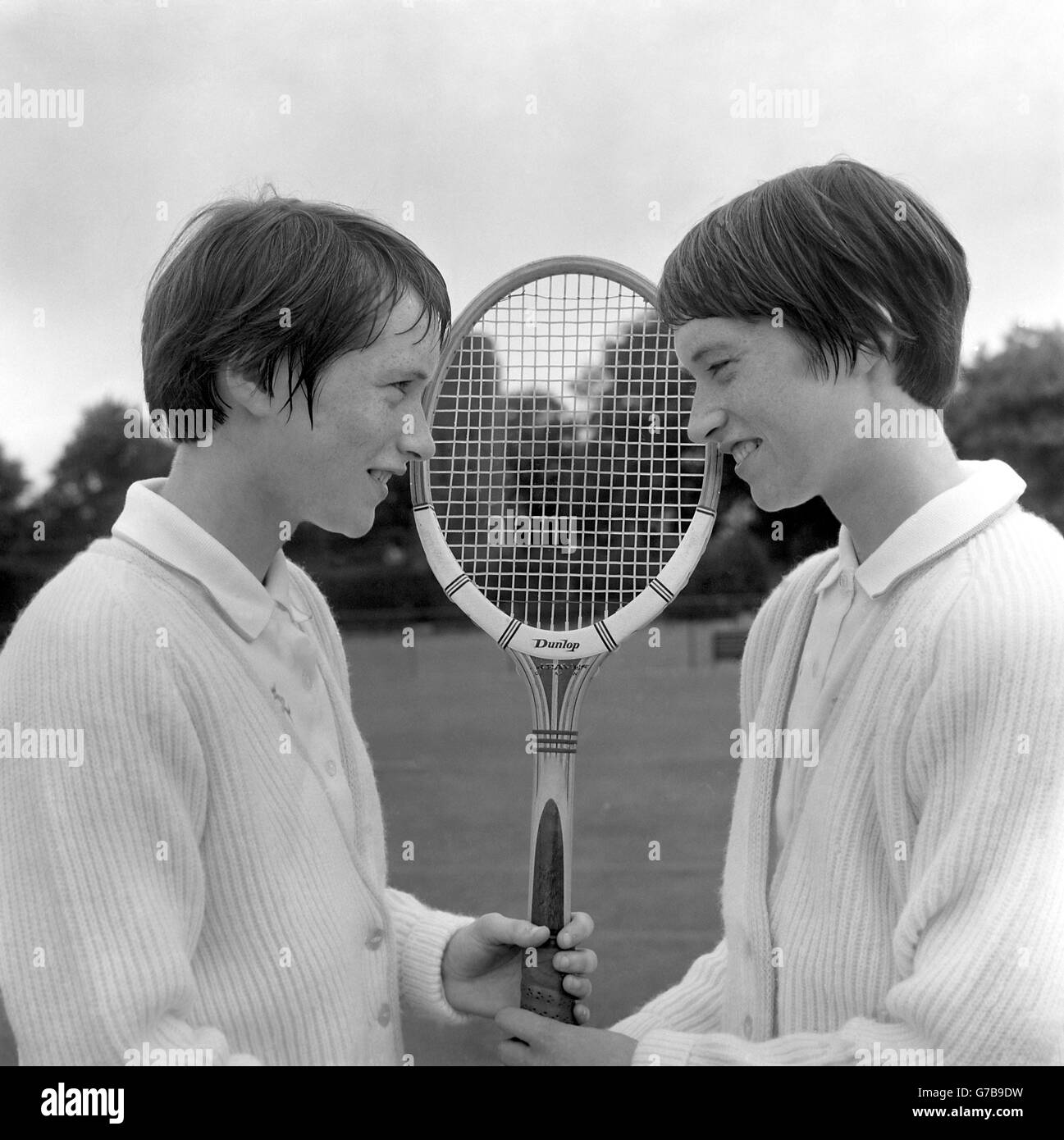 Identical twins taking part in the championship are Gwen (left) and Evelyn Armstrong, aged 16, from Kilmacolm near Glasgow. Gwen won her match against Miss H. Retter and Evelyn lost to Miss D. Oakley. Stock Photo