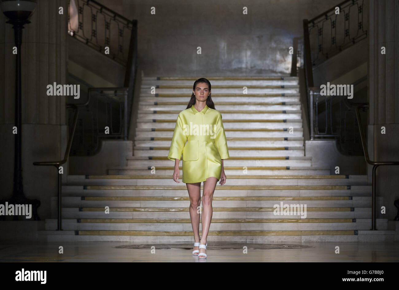 A model on the catwalk during the Emilia Wickstead catwalk show at The Banking Hall in London during London Fashion Week. Stock Photo