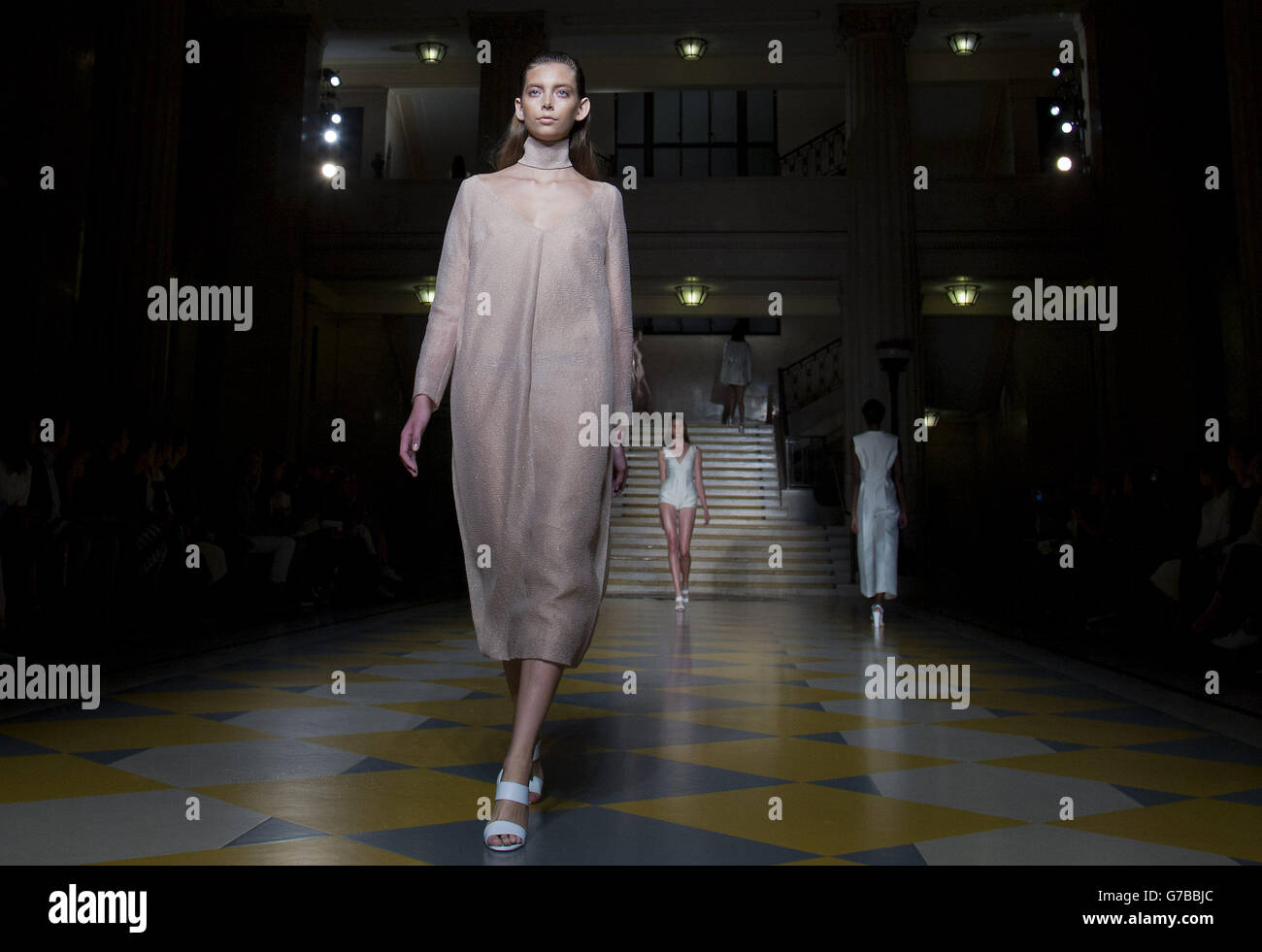 Models on the catwalk during the Emilia Wickstead catwalk show at The Banking Hall in London during London Fashion Week. Stock Photo