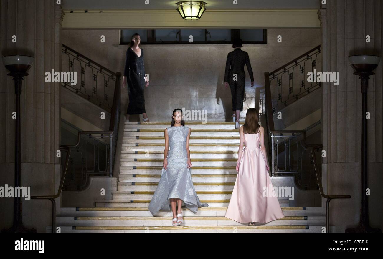 Models on the catwalk during the Emilia Wickstead catwalk show at The Banking Hall in London during London Fashion Week. Stock Photo