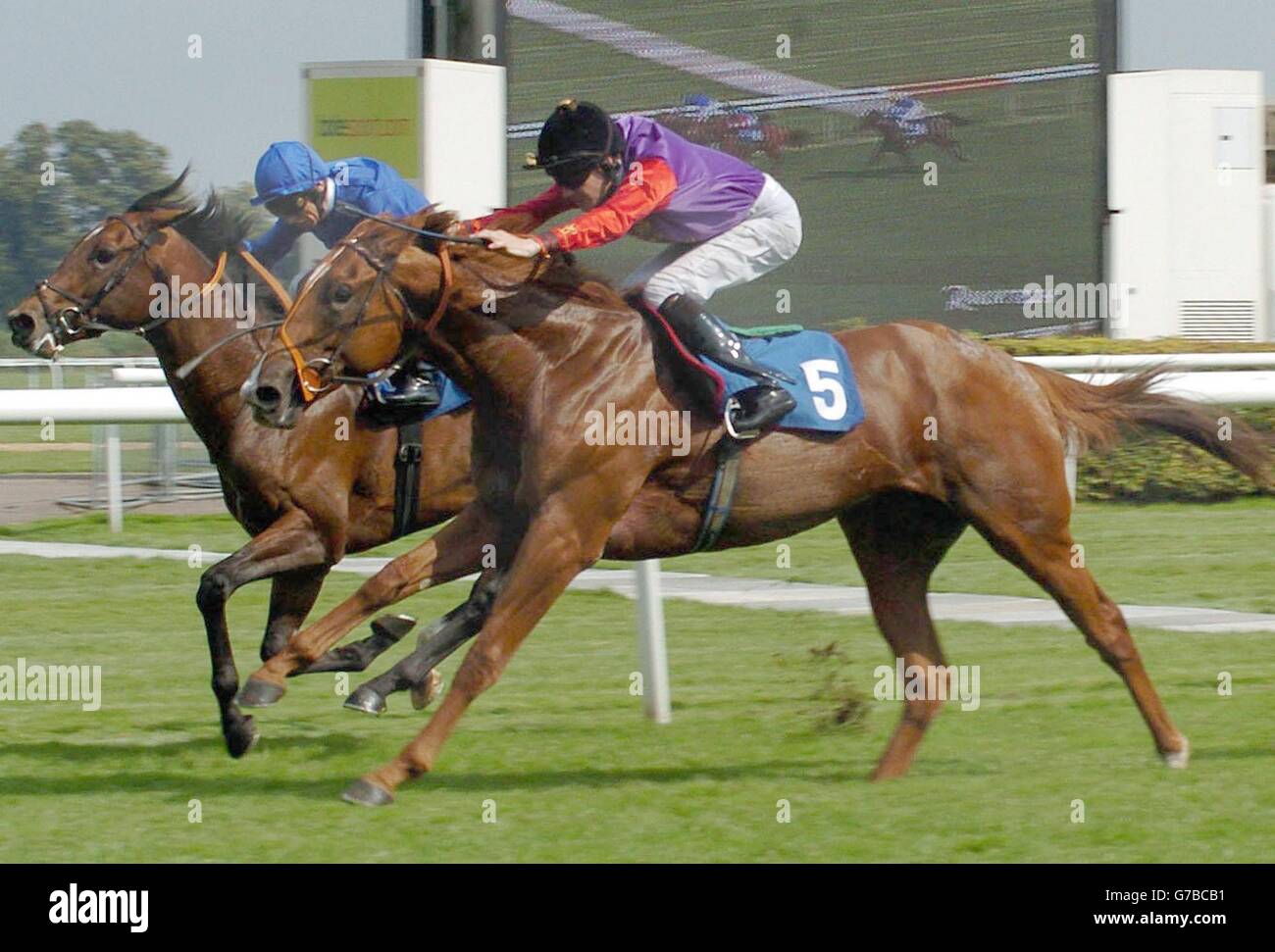 Humerous (blue) ridden by Frankie Dettori goes on to win the Rukba Senate Consulting E.B.F. Maiden Stakes Division Two at Kempton Park. Forward Move (5) ridden by Richard Hughes came second while Front Stage ridden by Kieren Fallon came third. Stock Photo