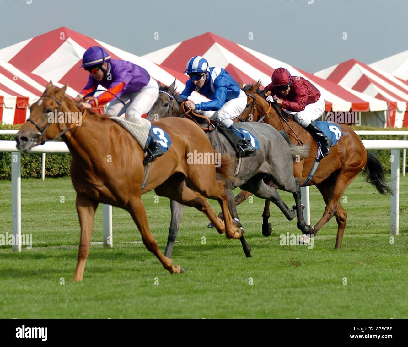 Joint Aspiration ridden by Samuel Hitchcott (left) goes on to win the Rukba Pafs E.B.F. Fillies' Conditions Stakes at Kempton Park. Stock Photo