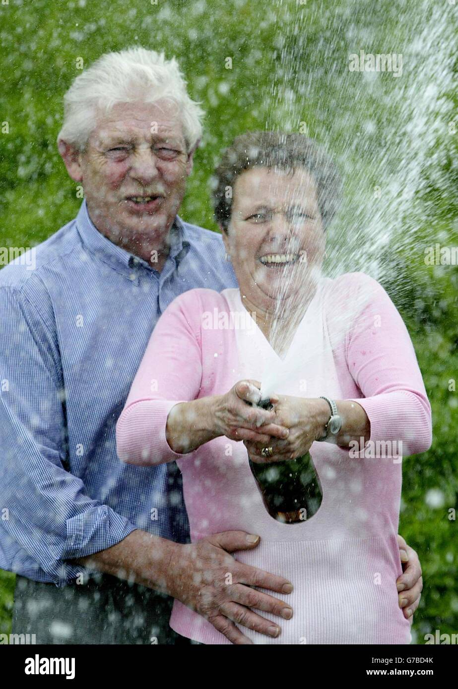 Freda Cowley, 45, a sheltered accommodation warden, and her husband Derrick celebrate after she won 1.2 million on the lottery. The grandmother-of-six hid her winning lottery ticket in her knicker drawer before handing it over to Camelot. The couple, from Whitley Bay, North Tyneside, plan to buy a new bungalow in the town and Mr Cowley will splash out on a new Volvo. Stock Photo