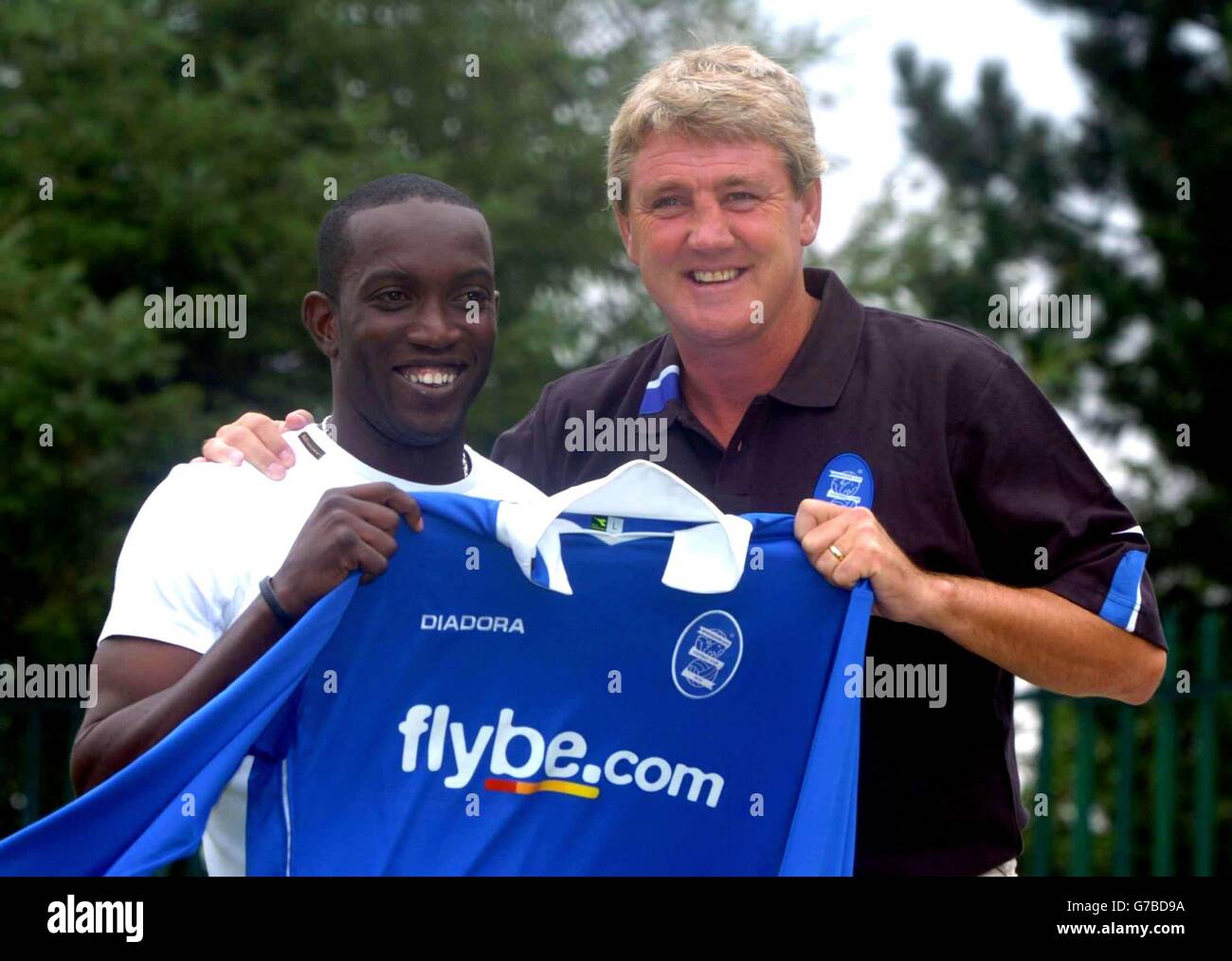 Dwight Yorke (left) is unveilled as the new Birmingham City signing at Wast Hills training ground, Birmingham with manager Steve Bruce (right). Stock Photo