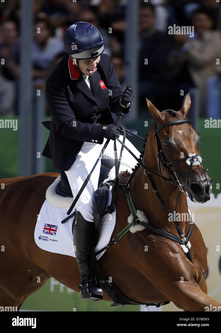 Great Britain's Zara Phillips riding High Kingdom competes in the final phase oif the Eventing competition during day eight of the Alltech FEI World Equestrian Games at Stade D'Ornano, Normandie, France. Stock Photo