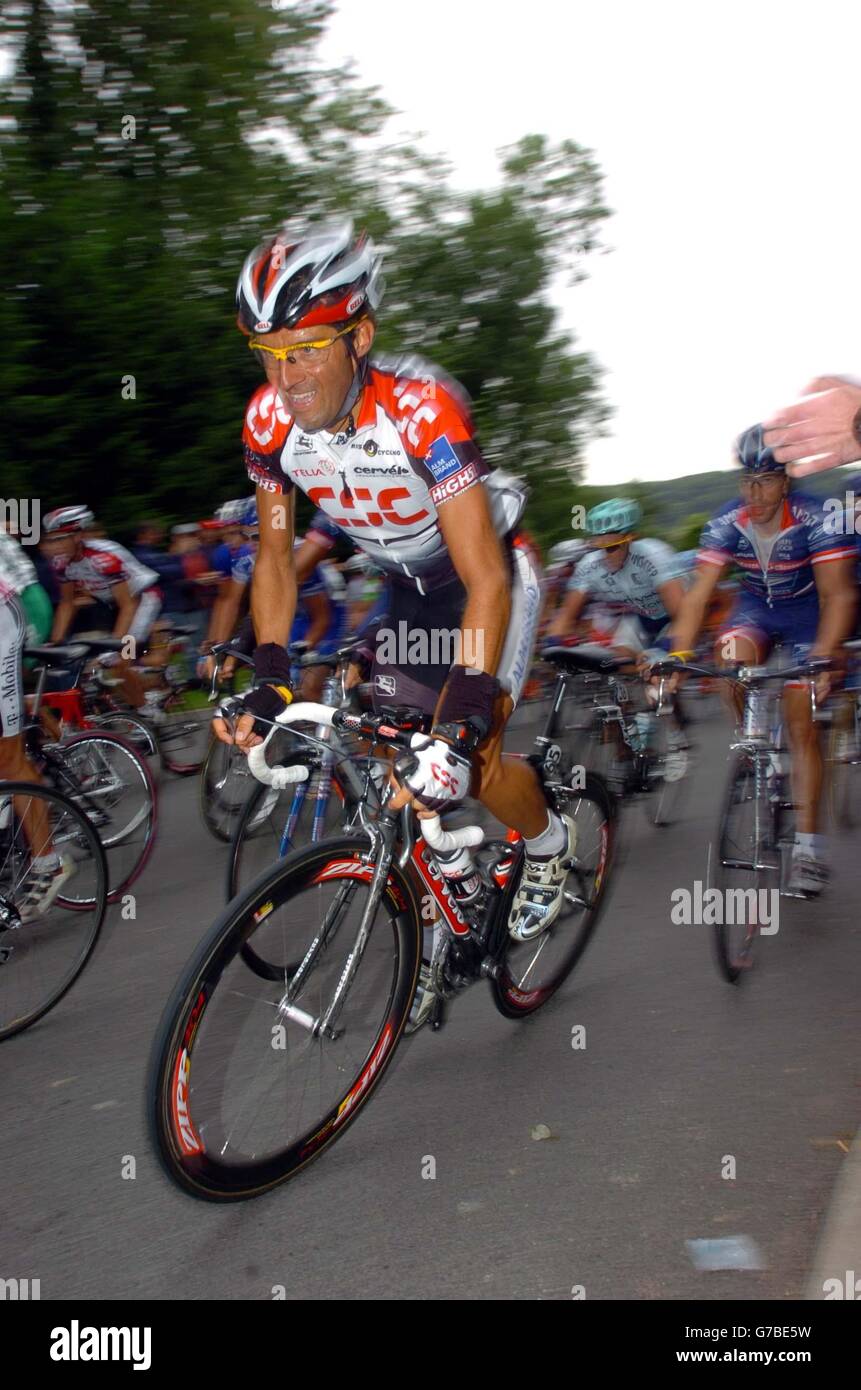 Italian rider Andrea Peron attacks one of the climbs into the Celtic Manor. Stock Photo