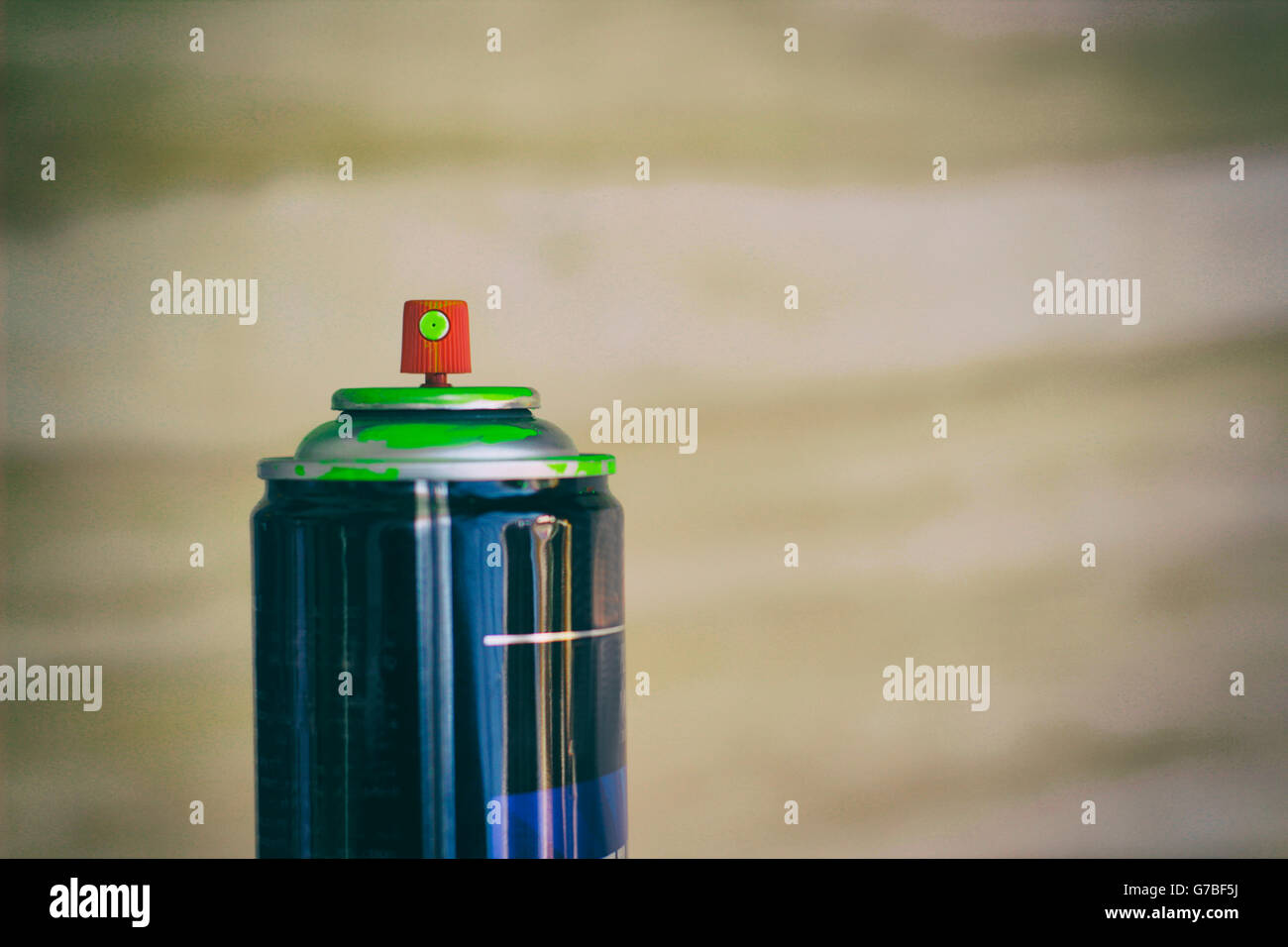 Photograph of a spray paint can and a blurred background Stock Photo