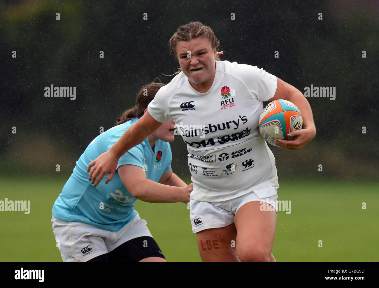 England London and South East's Sarah Bern hands off a tackle against