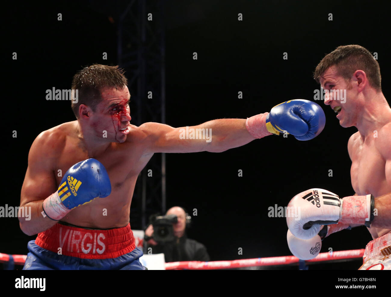 Eamon O'Kane (left) in action against Virgilijus Stapulionis during their IBF Intercontinental Middleweight fight in the Titanic Quarter, Belfast. Stock Photo