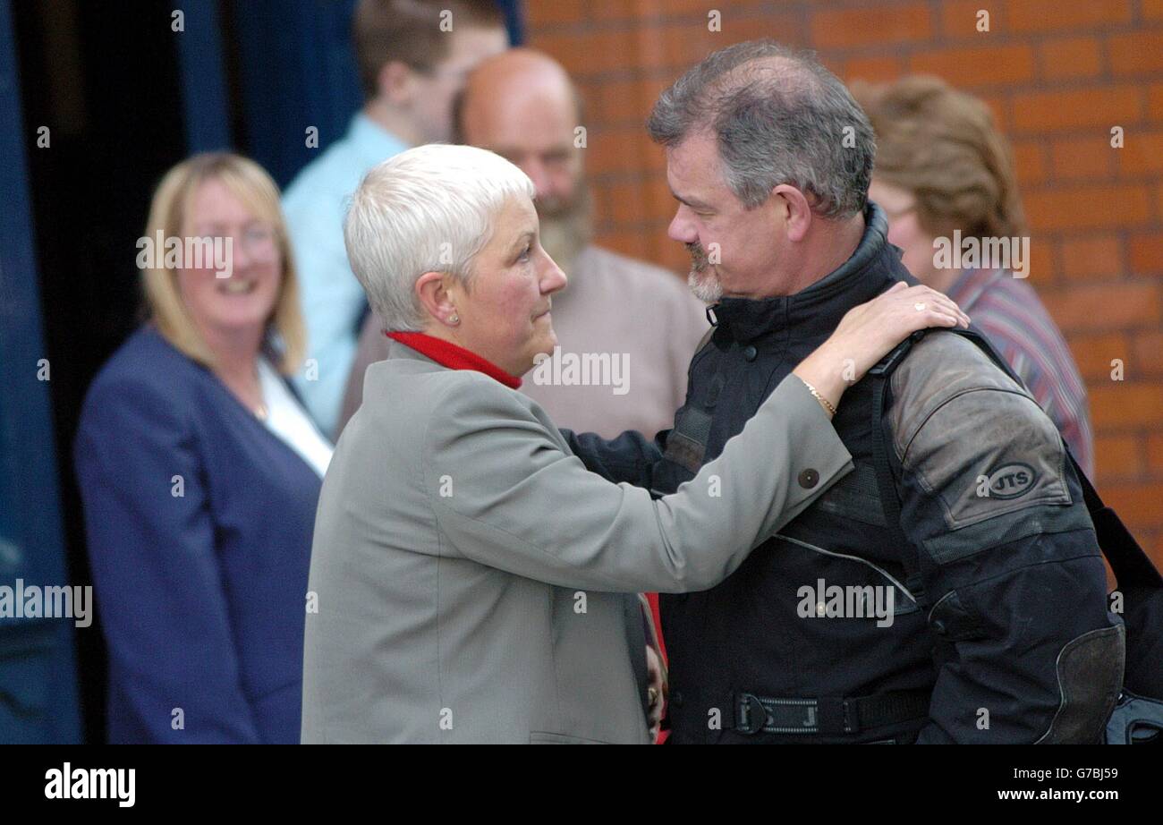 Susan Graham, mother of hit-and-run victim Kenneth Nielsen, 29, with an unidentified man (right) leaving an inquest at the Coroners Court in Dublin. Peter Joyce of Log Cabin, Dunsink Lane, Finglas, refused to appear before the coroner's court. Joyce who is currently serving a three-year prison sentence in Mountjoy Prison, was driving a Ford Fiesta on the wrong side of Forrest Road on May 6, 2003 when he fatally injured Mr Kenneth Nielsen riding a Harley Davidson motorcycle. Stock Photo