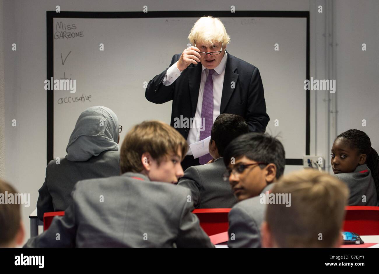 London Mayor Boris Johnson teaches a Latin lesson at the East London