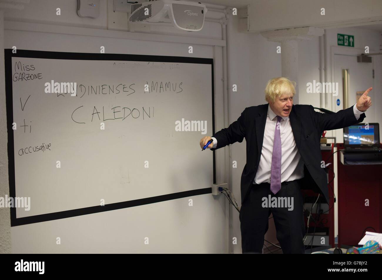 London Mayor Boris Johnson teaches a Latin lesson at the East London
