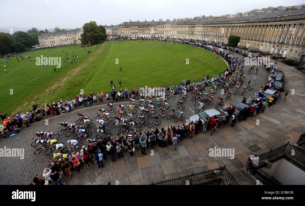 The Peloton makes it's way through the Royal Cresent in Bath as seen from No.1 Royal Cresent at the start of stage six of the 2014 Tour of Britain. Stock Photo