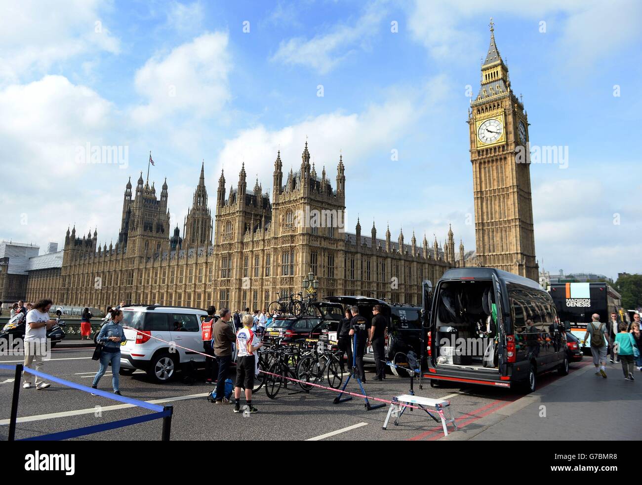 Teams park up on Westminster Bridge before the Individual Time Trial during stage eight of the 2014 Tour of Britain in London. Stock Photo