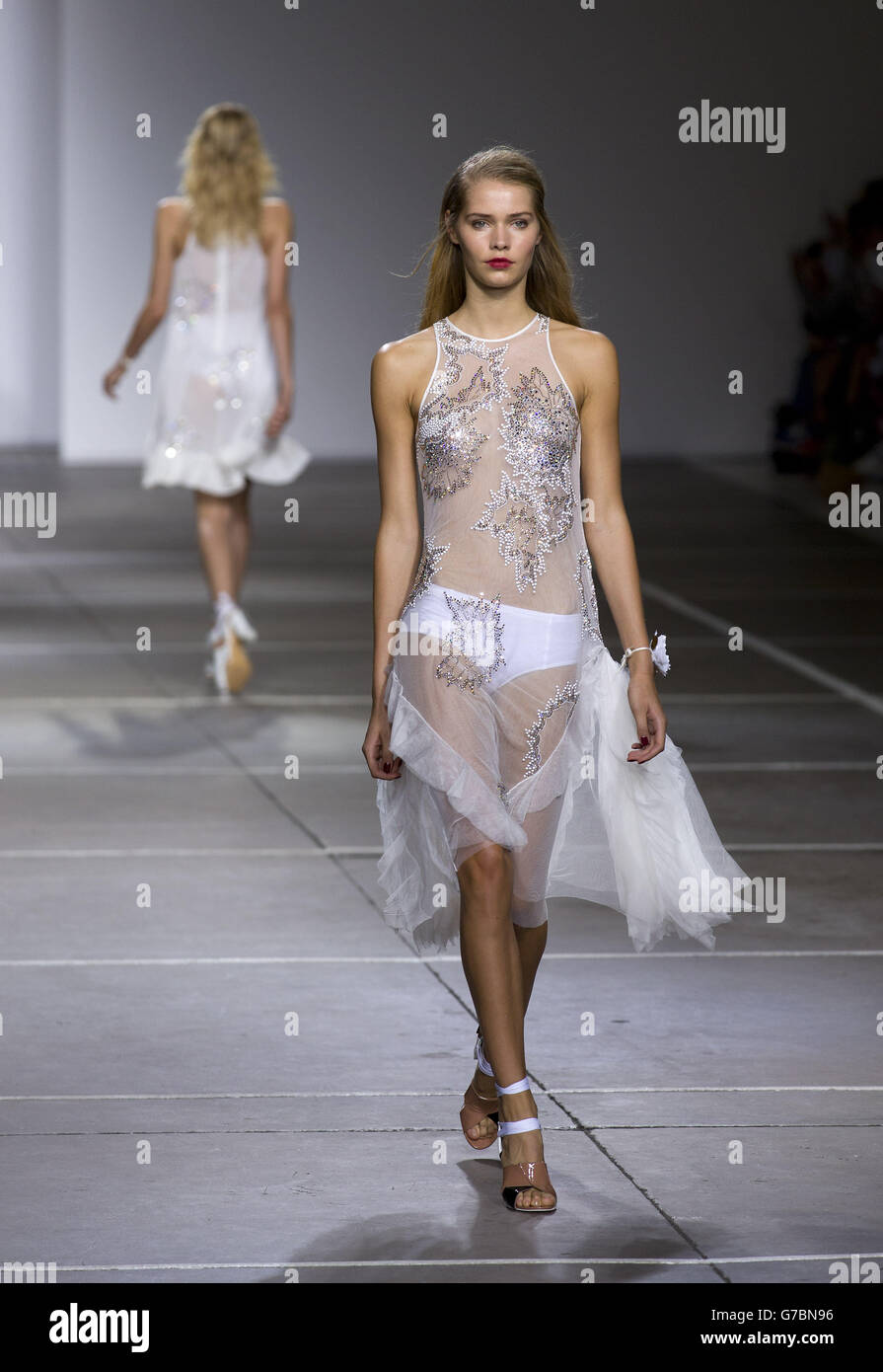 Models on the catwalk at the Topshop Show Space in London during London Fashion Week. Stock Photo