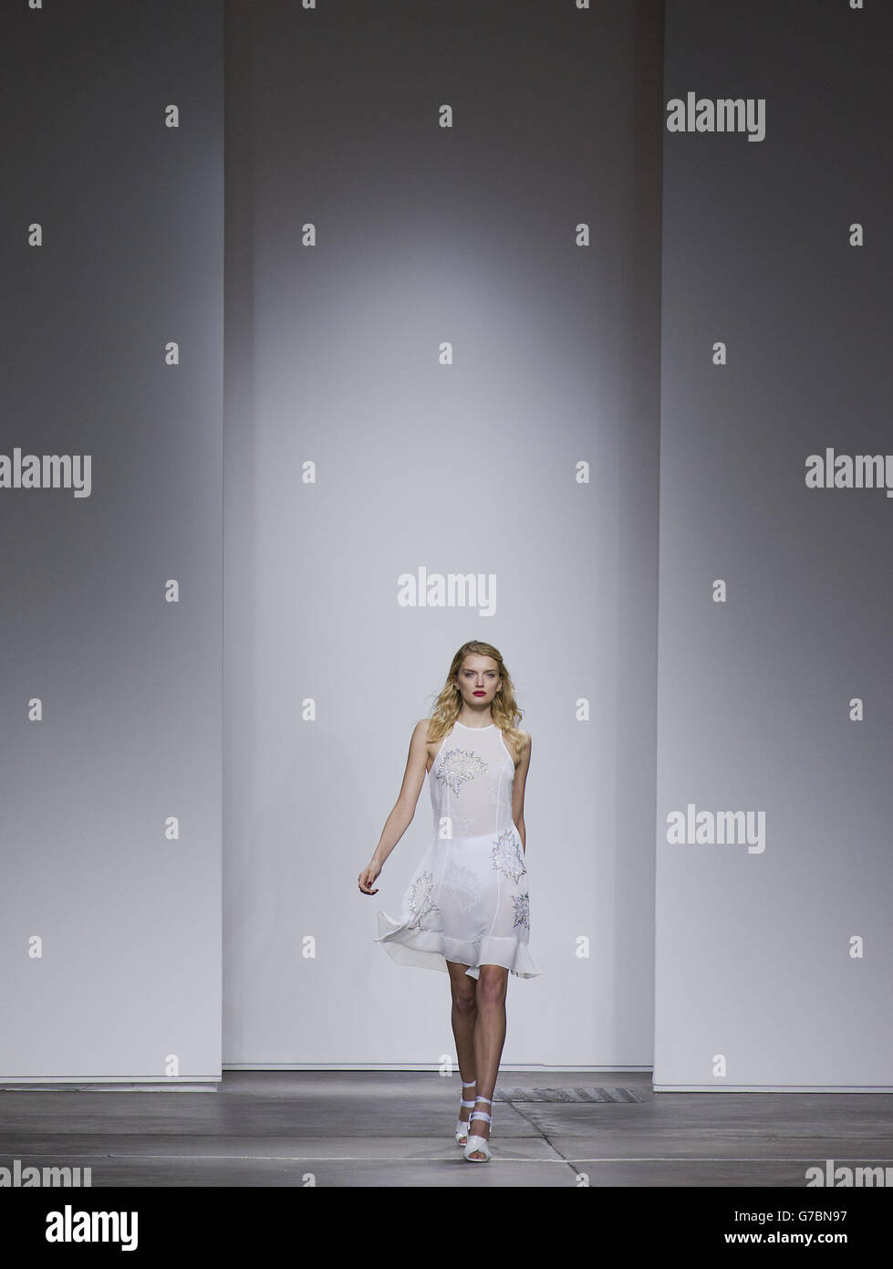 Topshop catwalk - London Fashion Week 2014. A model on the catwalk at the Topshop Show Space in London during London Fashion Week. Stock Photo