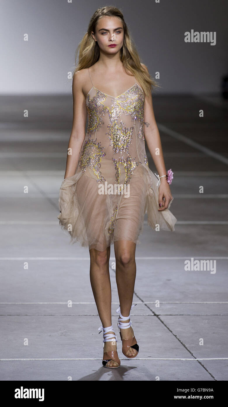 Topshop catwalk - London Fashion Week 2014. Cara Delevingne on the catwalk at the Topshop Show Space in London during London Fashion Week. Stock Photo