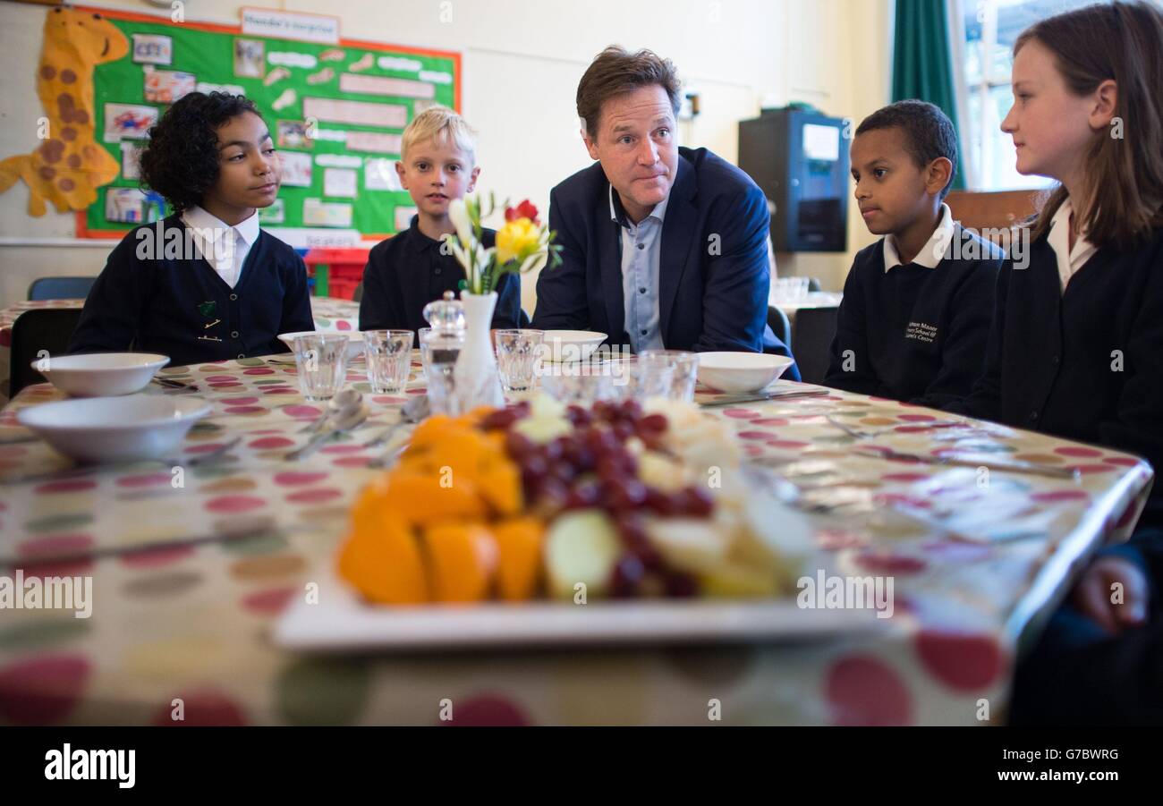 Deputy Prime Minister Nick Clegg meets pupils at Clapham Manor Primary School in south west London, where he officially launched the government's scheme to provide 5-7 year olds with free school meals. Stock Photo