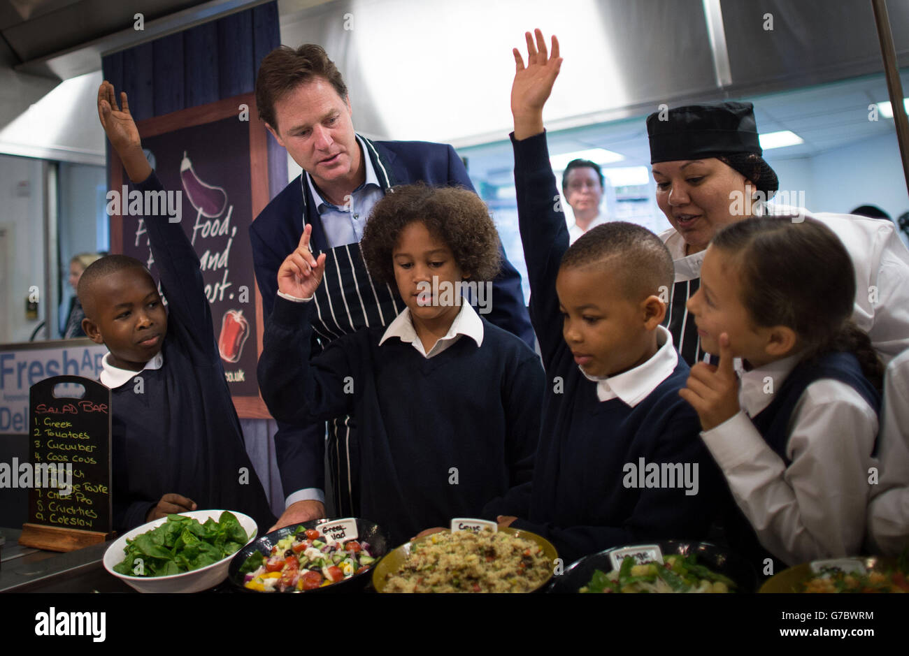 Deputy Prime Minister Nick Clegg meets pupils at Clapham Manor Primary School in south west London, where he officially launched the government's scheme to provide 5-7 year olds with free school meals. Stock Photo