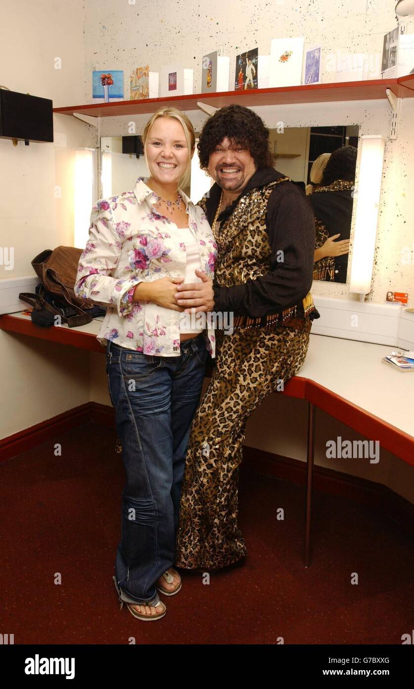 Pregnant actress Charlie Brooks visits her former Eastenders co-star Shaun Williamson backstage in his dressing room at the Apollo Theatre in Victoria, central London, after watching him perform in the musical 'Saturday Night Fever'. Stock Photo