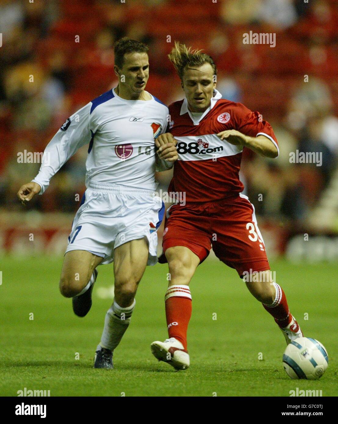 Boro's Bolo Zenden (right) and Zdenek Pospech of Banik Ostrava during the UEFA Cup First Round, First Leg, tie at the Riverside Stadium, Middlesbrough. NO WEBSITE/INTERNET USE UNLESS SITE IS REGISTERED WITH FOOTBALL ASSOCIATION PREMIER LEAGUE Stock Photo
