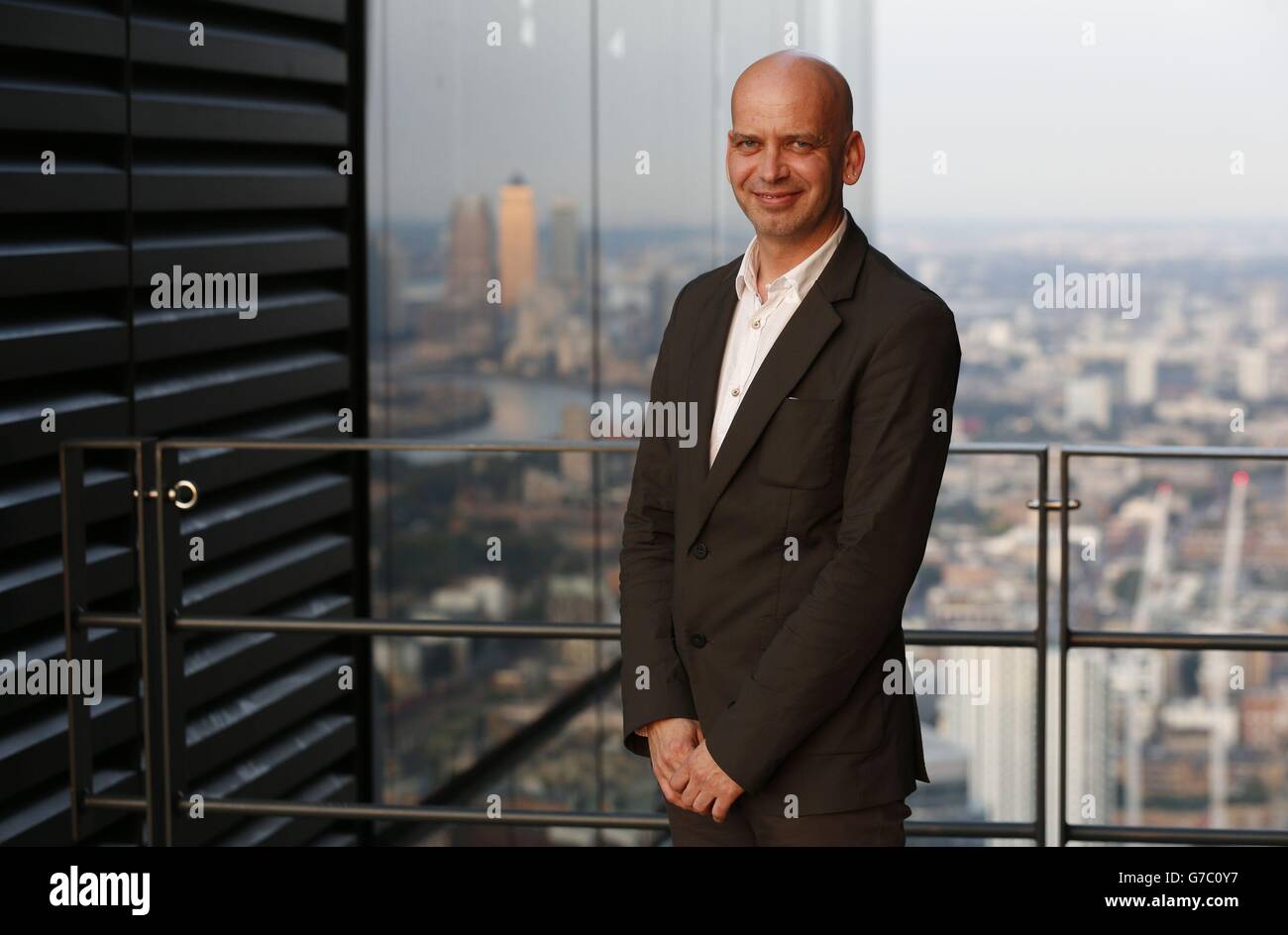 Project architect, Andy Young of RSHP poses on the forty seventh floor of The Leadenhall Building, known as the 'Cheesegrater', during the building's unveiling, 122 Leadenhall Street, City of London. Stock Photo