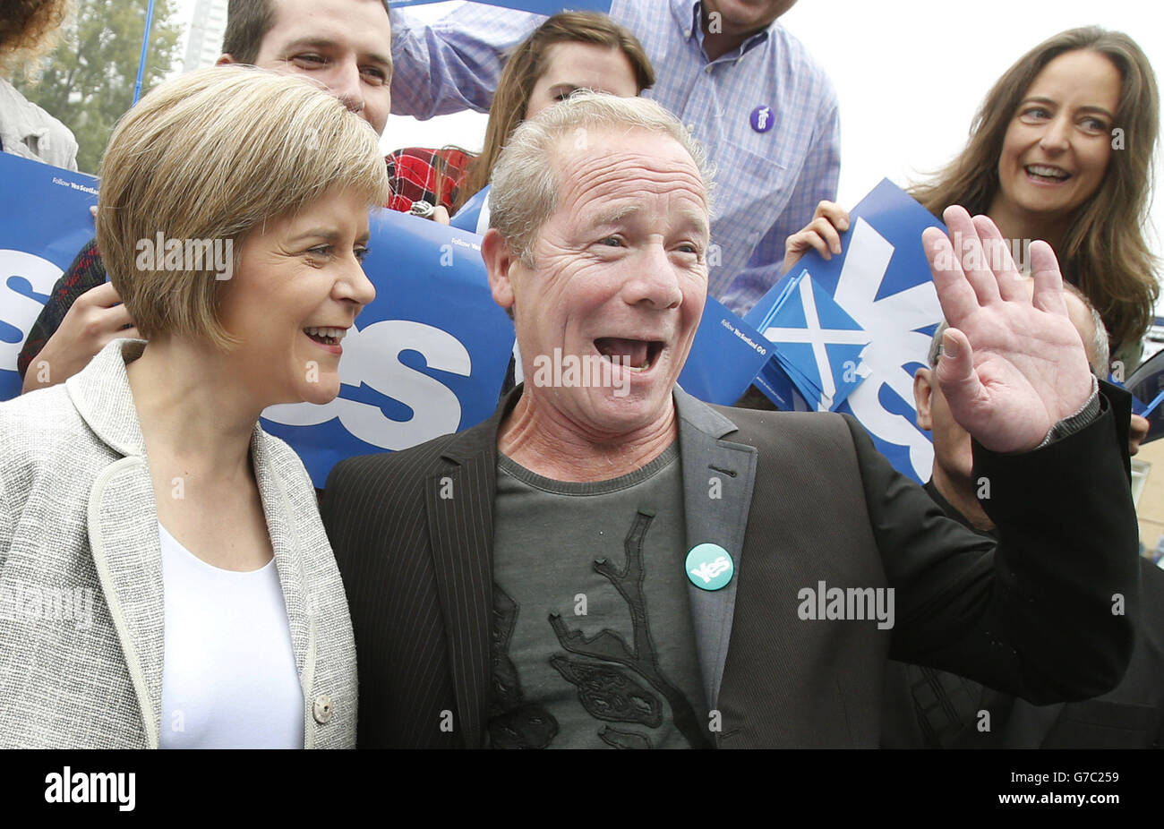 Deputy First Minister of Scotland Nicola Sturgeon is joined by actor Peter Mullan on the campaign trail ahead of the Scottish independence referendum, outside Drumchapel Shopping Centre in Glasgow, as she and the First Minister are aiming to visit Scotland's seven cities in one day. Stock Photo