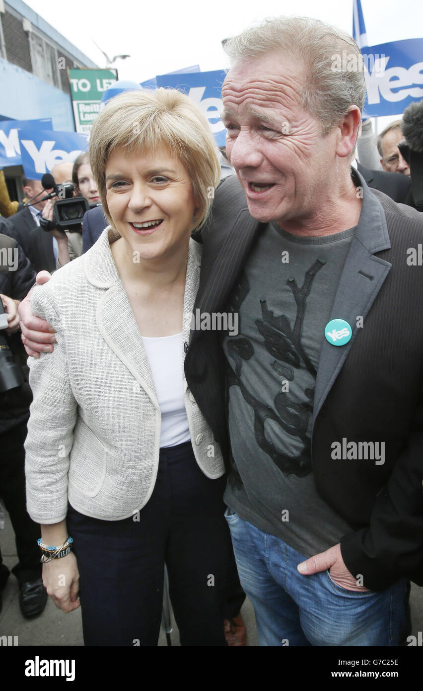Deputy First Minister of Scotland Nicola Sturgeon is joined by actor Peter Mullan on the campaign trail ahead of the Scottish independence referendum, outside Drumchapel Shopping Centre in Glasgow, as she and the First Minister are aiming to visit Scotland's seven cities in one day. Stock Photo