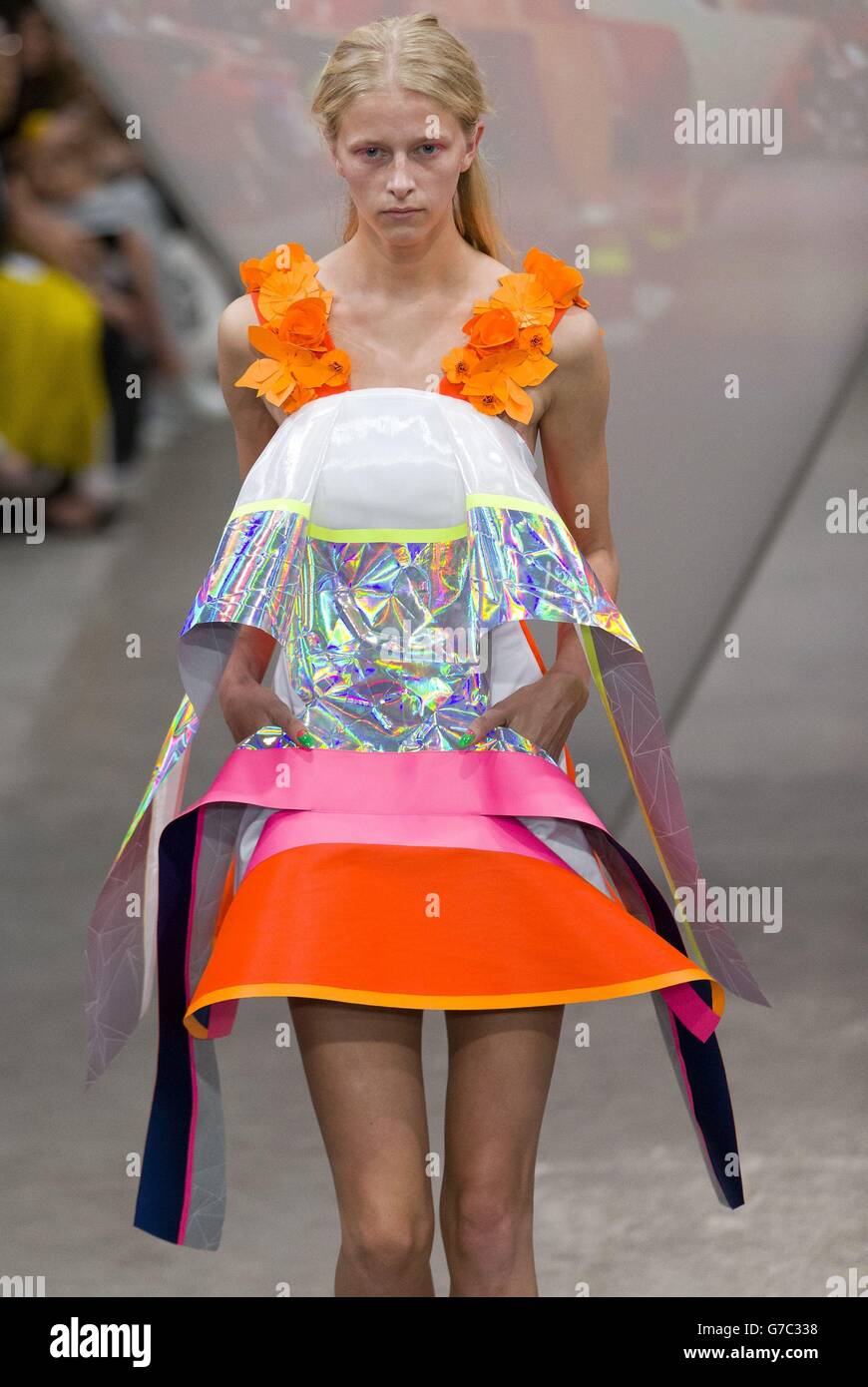 A model on the catwalk during the Fyodor Golan catwalk show in London during London Fashion Week. Stock Photo