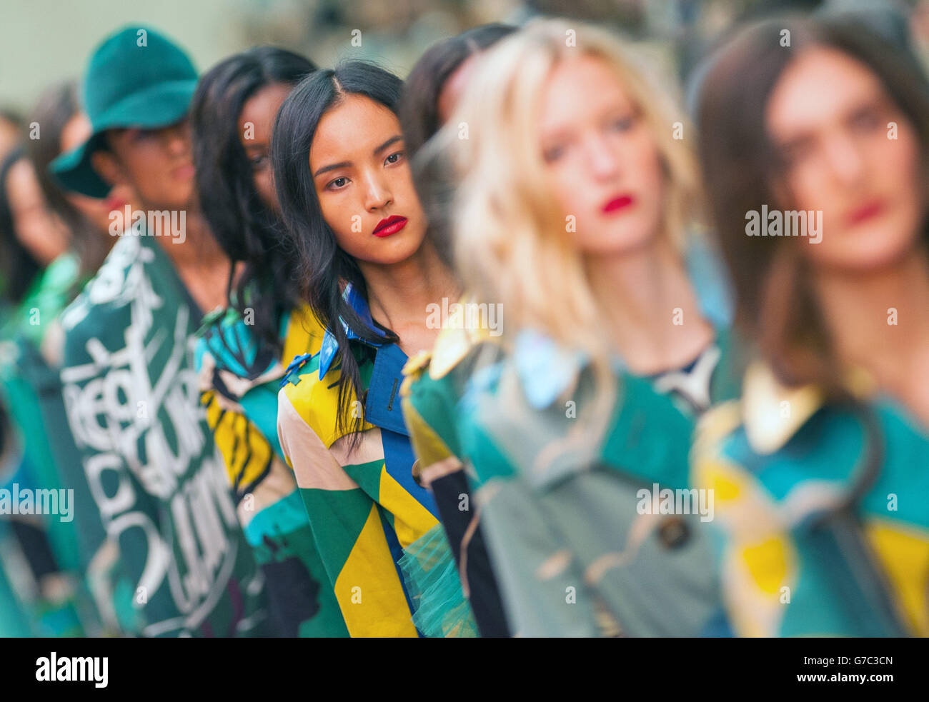 Models on the catwalk for the Burberry Prorsum womenswear catwalk show at the Albert Memorial, London, during London Fashion Week. Stock Photo