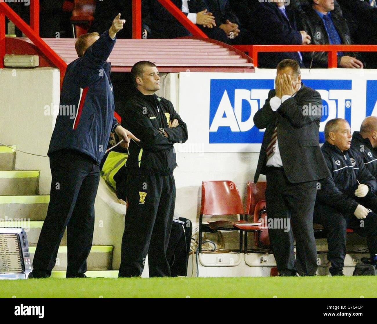 Aberdeen manager Jimmy Calderwood holds his head after Rangers score during their CIS Insurance Cup third round match at Pittodrie Stadium, Aberdeen. EDITORIAL USE ONLY. Stock Photo