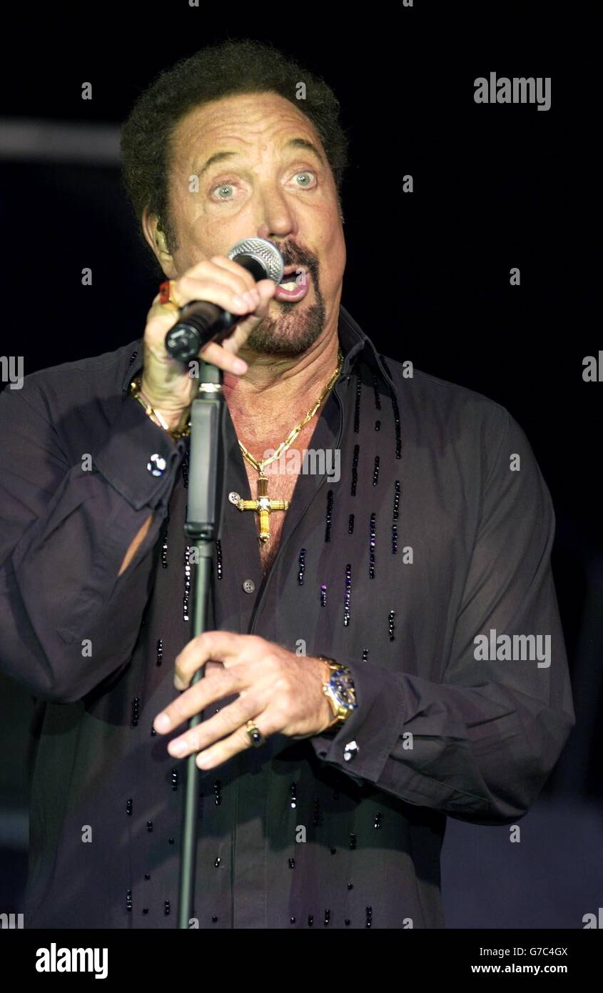 Tom Jones performs live on stage with Jools Holland at the Carling