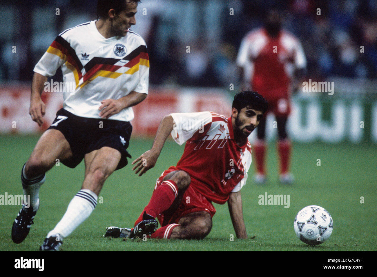 West Germany's Pierre Littbarski (l) tussles with a United Arab Emirates  player Stock Photo - Alamy