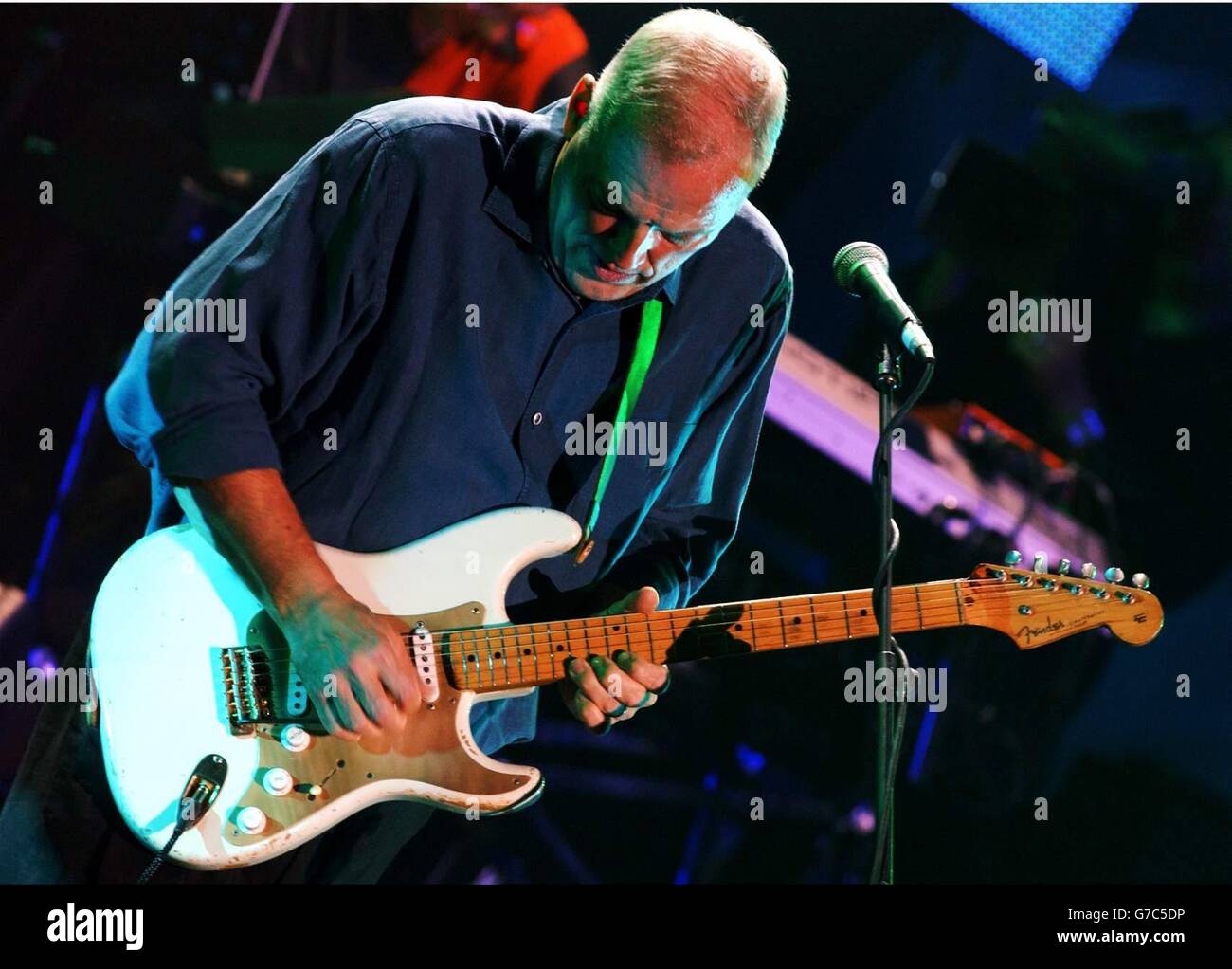 Pink Floyd's Dave Gilmour performs onstage during The Miller Strat Pack concert, held at the Wembley Arena, London. Gilmour is playing the 1954 Fender Stratocaster with the unique serial number of 0001. Stock Photo