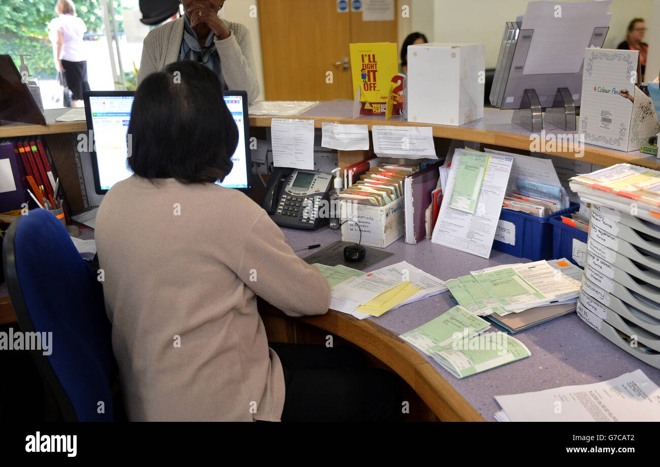 Gp Practice Receptions Health centre receptionist hi-res stock photography and images - Alamy