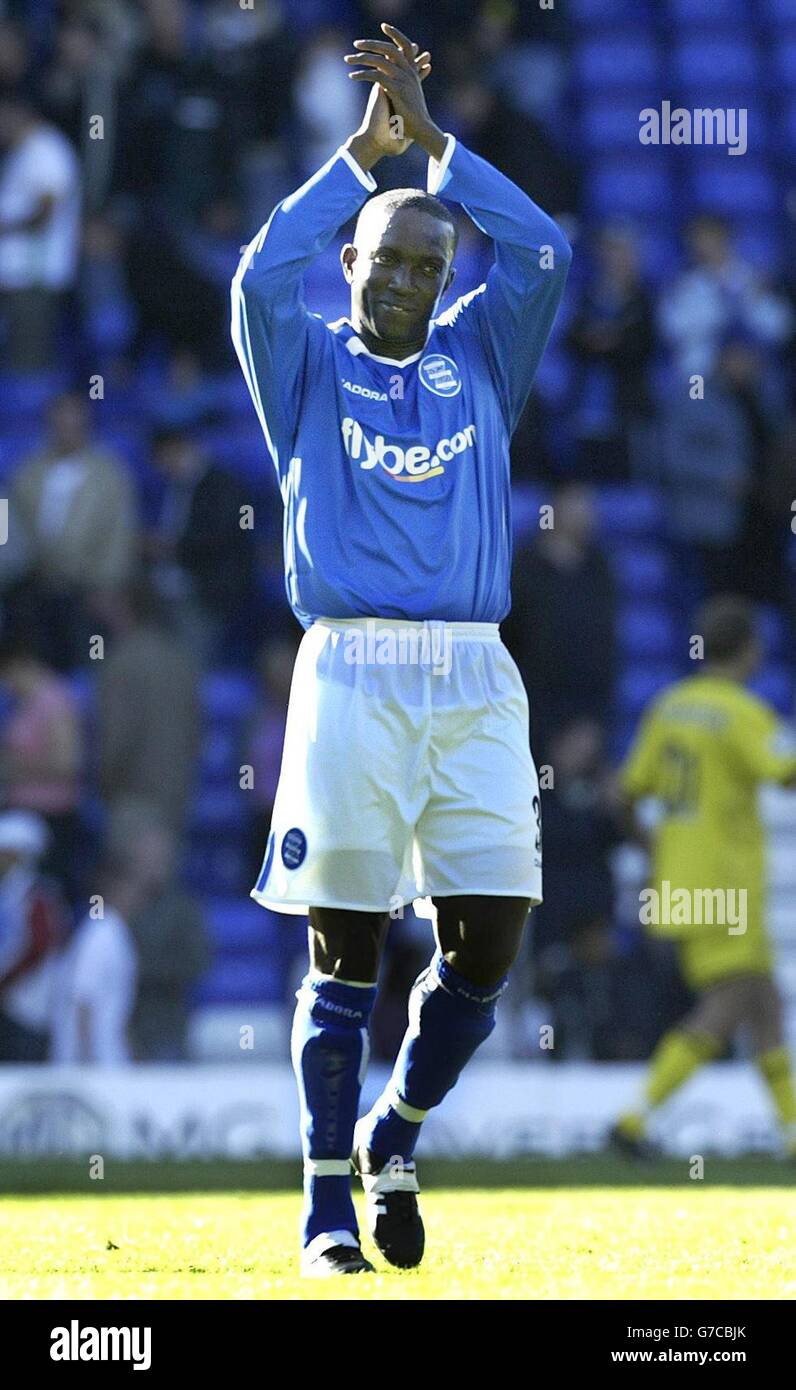 Birmingham City's new signing Dwight Yorke waves to the fans at end of the game after he scored equalising goal, during the Barclays Premiership match at St Andrews, Birmingham, Saturday September 18, 2004. Stock Photo