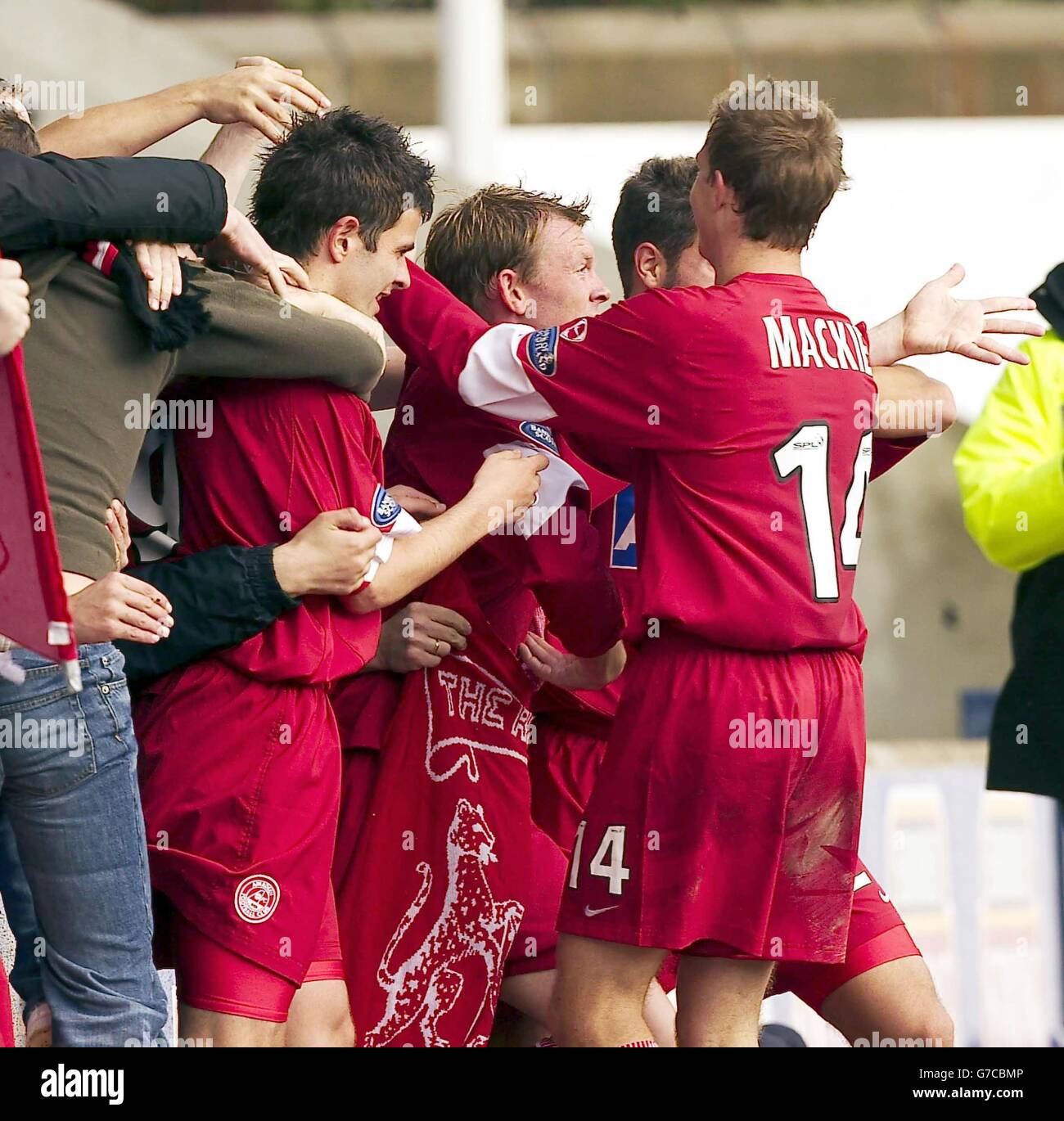 Aberdeen players celebrate following an own goal scored by Kilmarnock's James Fowler (not pictured) during the Bank of Scotland Premier League match at Rugby Park, Kilmarnock, Saturday September 18, 2004. EDITORIAL USE ONLY. Stock Photo