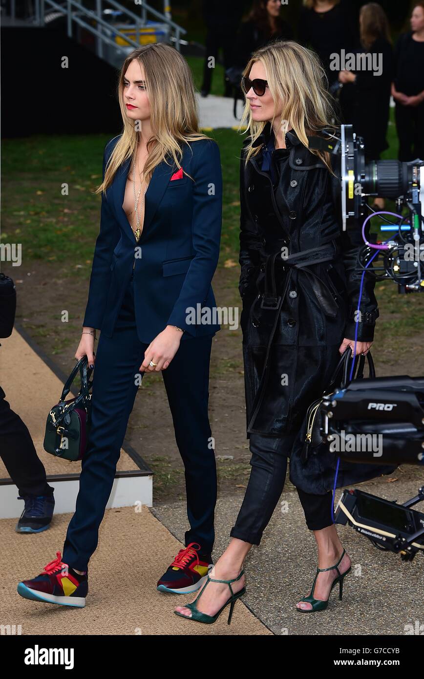 Cara Delevingne and Kate Moss arriving for the Burberry Prorsum womenswear  catwalk show at Kensington Gardens, London Stock Photo - Alamy